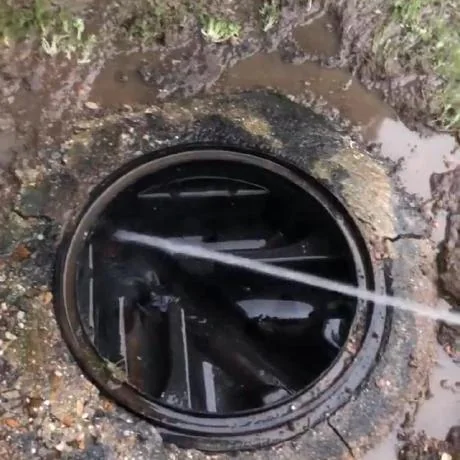 Excavated drain run being repaired at an Essex property