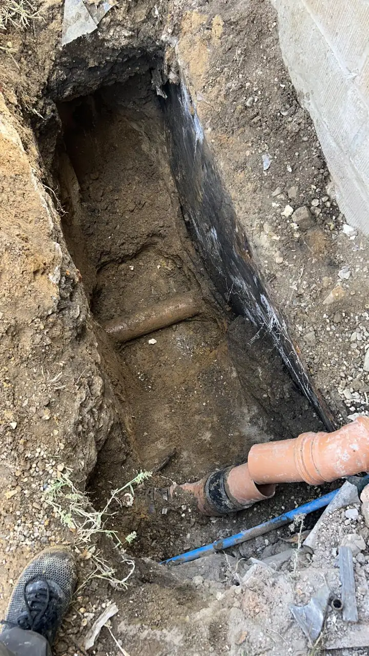Plumbers in Rainham working on a domestic drainage repair